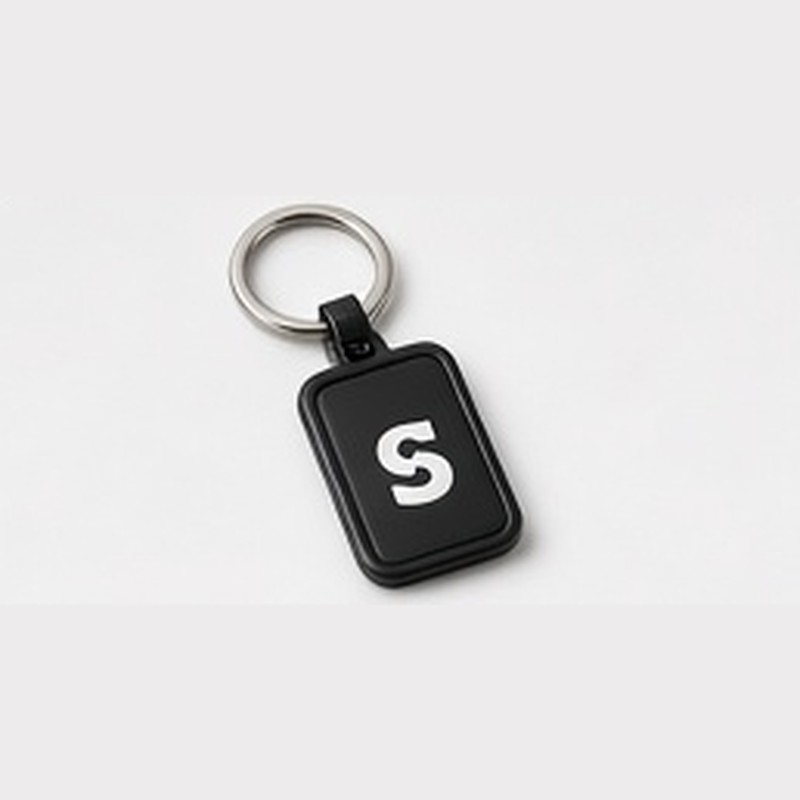 Metal Keychain, black face with a silver mark