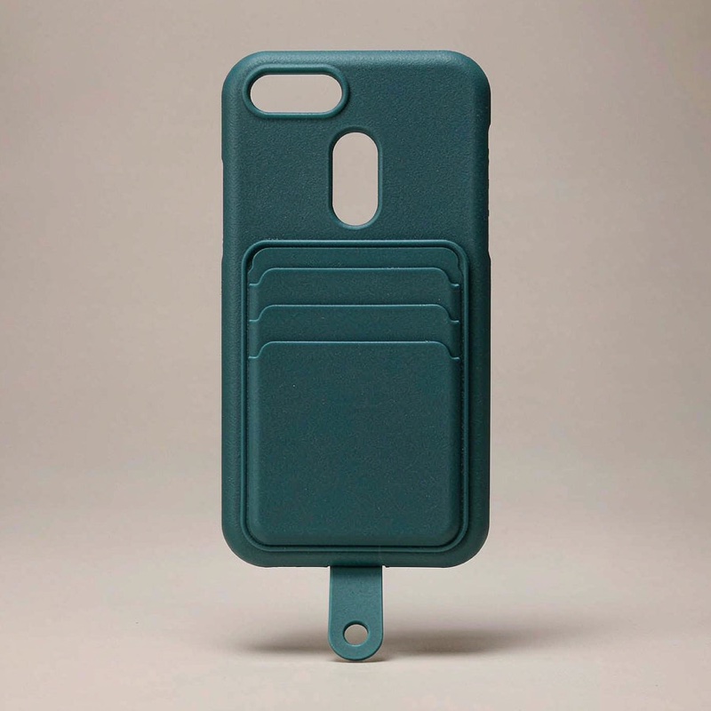 Silicone Phone Wallet, matte teal on a phone back